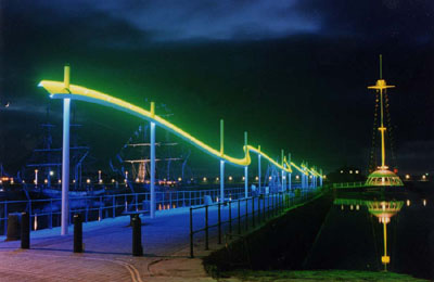 Whitehaven harbour and the blue wave at night